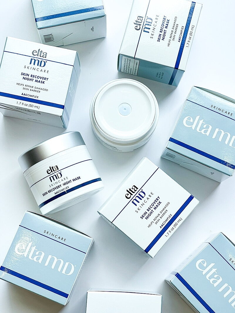 Elta MD skincare products displayed on white background.